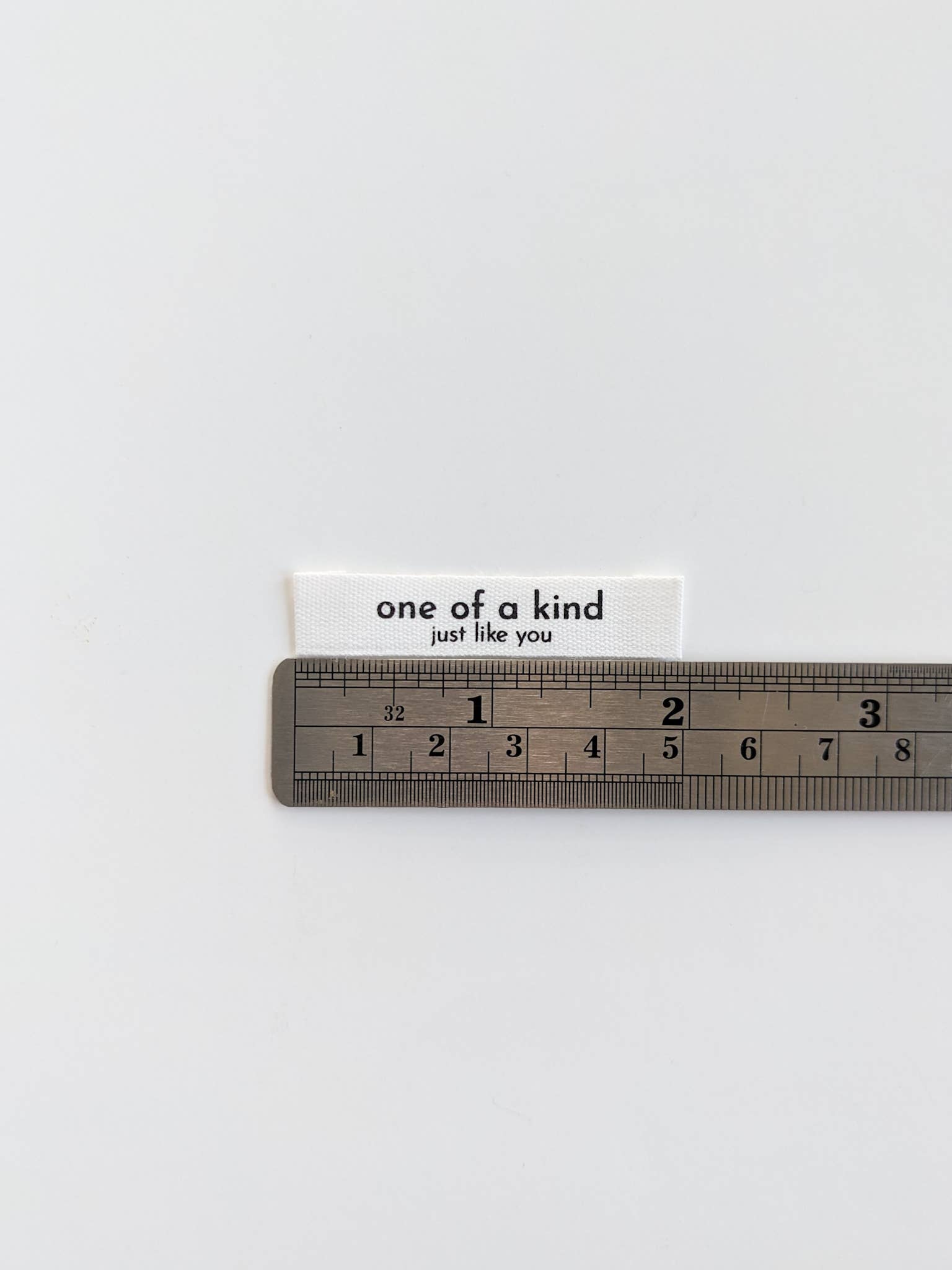 Sy-inn Merkelapper Bomull "One of a Kind, Just Like You"