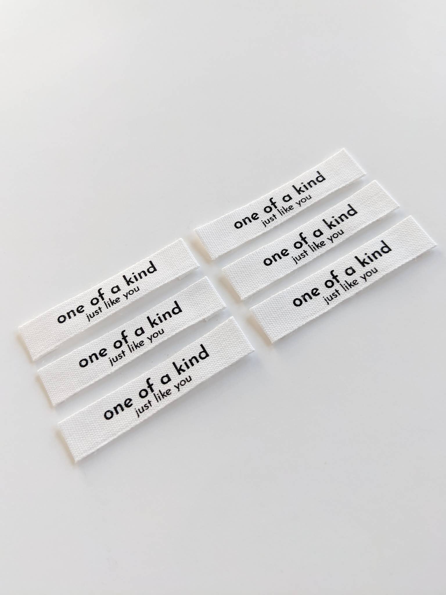 Sy-inn Merkelapper Bomull "One of a Kind, Just Like You"